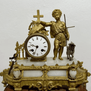 Reloj de Bronce dorado con figura del Buen Pastor